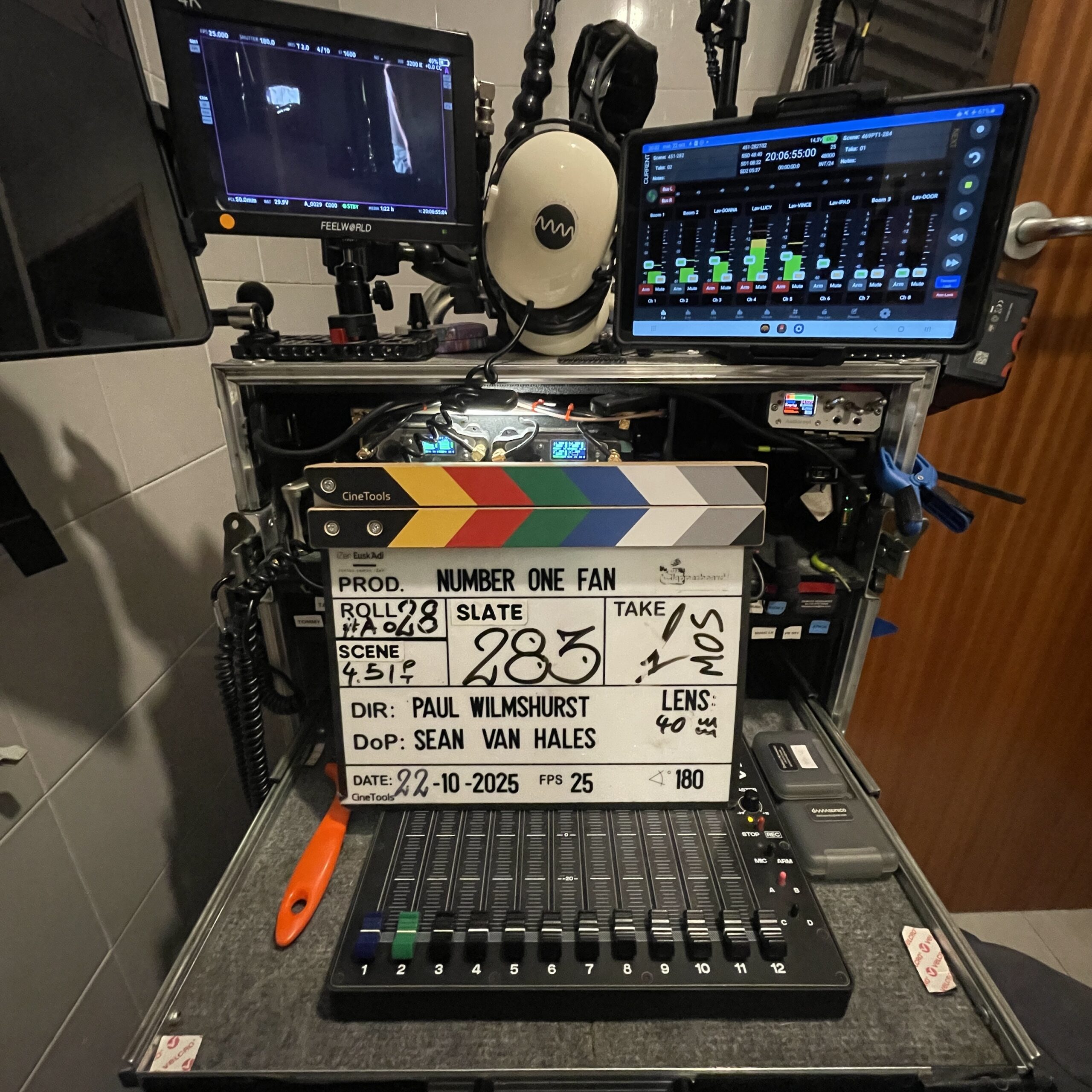 Damasonico sound mixer sound cart on set with slate